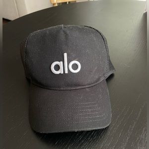 Alo Yoga Black Trucker Hat